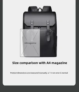Front detail of black business backpack showing size comparison with an A4 magazine
