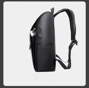 Side view of black minimalist backpack showing large capacity and padded shoulder straps