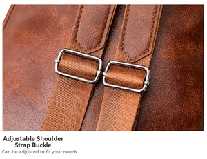 Close-up of adjustable strap with silver metal buckle on brown faux leather backpack