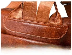 Macro shot showing high-quality stitching on the durable brown leather backpack strap