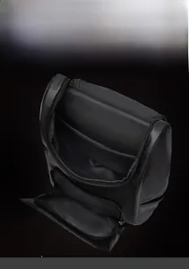 Detailed top view of black leather laptop backpack with multi-pocket storage design