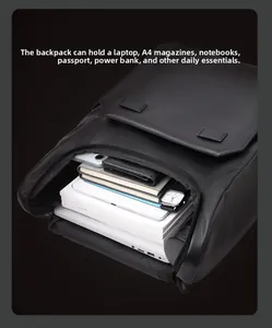 Detailed view of spacious black business backpack interior with laptop and essentials