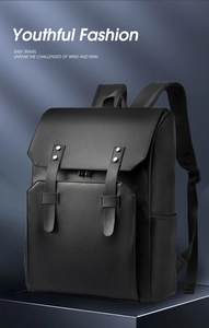 Detail of premium black PU leather backpack with vintage metal buckles and wide straps