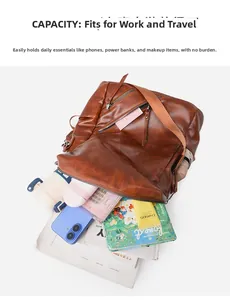 Detailed view of large capacity brown backpack interior showing travel and work essentials
