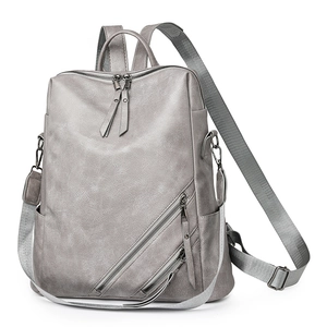 Grey checkered leather backpack for women with silver zippers and adjustable straps