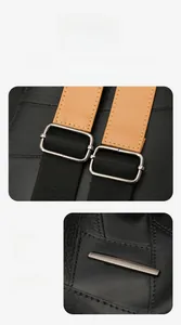 Detail of black lychee grain PU leather backpack with silver buckle and woven strap