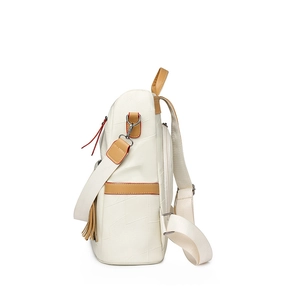 Detail view of cream PU leather backpack with brown tassels and side stitching detail