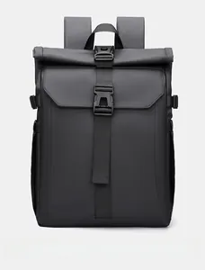 Front detail of minimalist roll-top backpack featuring heavy-duty buckle and waterproof fabric