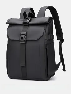 Detail view of the roll-top backpack with waterproof fabric and buckle straps