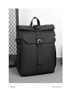 Detail of black waterproof roll-top backpack with buckle closure and matte fabric