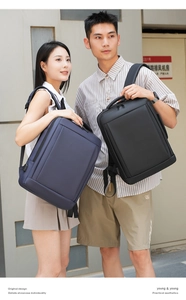 Detail view of business backpack with USB charging port in black and navy blue options