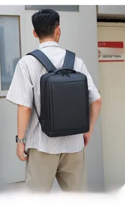 Outdoor side view of business backpack featuring a built-in USB charging port detail