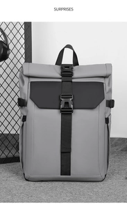 Detail of gray roll-top backpack with waterproof fabric and black buckle closure