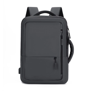 Minimalist grey laptop backpack with USB port and waterproof fabric for business or travel