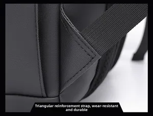 Macro shot of triangle reinforced shoulder strap stitching on black waterproof backpack
