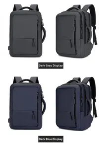 Side-by-side comparison of deep gray and navy blue ergonomic business laptop backpacks