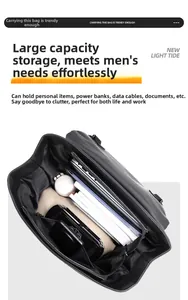 Internal compartments of the black laptop backpack showing large storage capacity