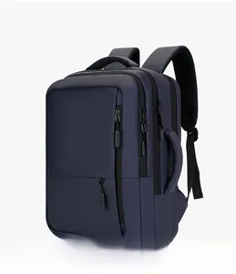 Detail of dark blue business laptop backpack with multiple zipper pockets and side handle