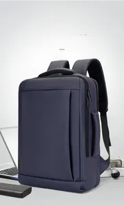 Detail of navy business backpack showing breathable mesh straps and functional compartments