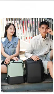 Outdoor shot of mint green and black unisex backpacks for daily commuting and campus life