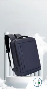 Lightweight navy business backpack side view with USB port on a white platform