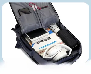 Detailed internal view of navy business backpack showing laptop sleeve and organizers