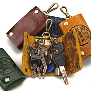 Detail showing high-capacity leather key wallet interior with multiple metal hooks