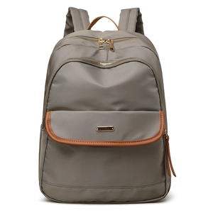 Minimalist dark gray waterproof backpack with brown leather trim and golden metal zippers