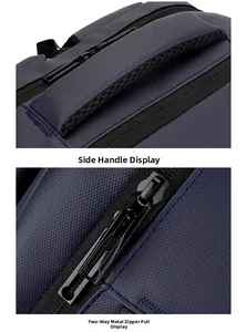 Detail of navy blue business backpack showing side handle and dual metal zippers