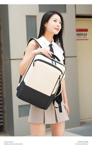 Outdoor shot of minimalist cream and black business backpack with functional front pockets