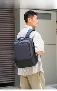 Detail of ergonomic padded straps and dual-tone waterproof nylon on the business backpack
