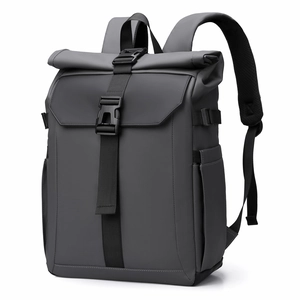 Waterproof roll-top business backpack in dark grey matte finish with secure buckles