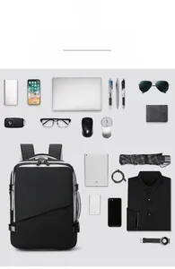 Draufsicht auf Business-Rucksack mit Laptop, Tablet und organisiertem Zubehör