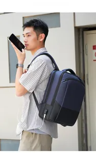 Detail of multi-layer waterproof backpack with external USB port for easy charging
