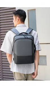 Detail of grey business backpack with external USB port and ergonomic side handle
