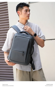 Dark grey business laptop backpack with USB charging port and multi-layer storage compartments