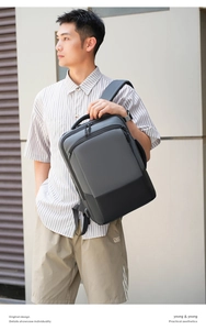 Close-up of a versatile business backpack featuring a side USB port and durable gray fabric