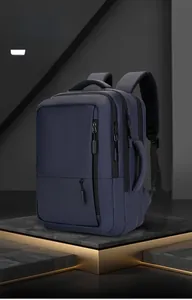 Macro view of blue business backpack with waterproof fabric and side handle detail