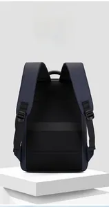 Detail of ergonomic breathable mesh back and luggage strap on navy business backpack