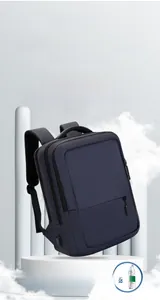 Detail view of Navy Blue Laptop Backpack showing water resistant fabric and USB port