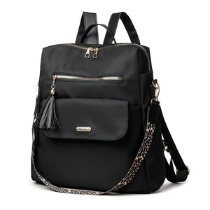 Black nylon fashion backpack with gold hardware and stylish leopard print shoulder strap