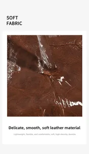 Gros plan montrant la texture imperméable et les gouttes d'eau sur le cuir souple marron