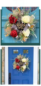 Detail of blessed floral wreath with red peonies and striped ribbon on a blue door