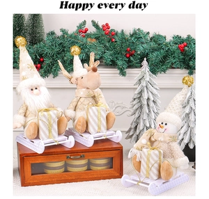 Detailed plush Christmas figurines set with Santa, reindeer and snowman on white sleds