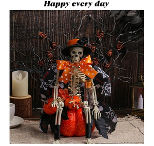 Detail of Halloween skeleton with black rose hat sitting on an orange pumpkin