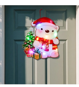Illuminated Christmas bear door hanger decoration with colorful LED lights on a wooden door