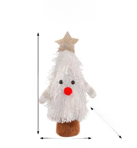 Vue détaillée de la figurine sapin de Noël en peluche blanche de 16,5 cm avec étoile dorée