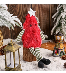 Long-legged Christmas tree plush doll sitting on a wood stump with festive holiday decor