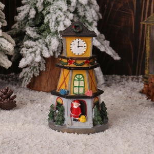 LED lighted resin Christmas clock tower with Santa Claus figurine and warm festive decor