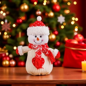 Cute knitted snowman plush doll with red scarf and heart sweater for Christmas decor